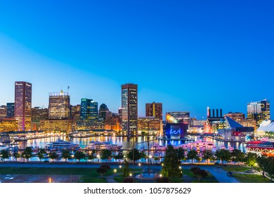 Baltimore,maryland,usa. 09-07-17 :  Baltimore Skyline At Night With Reflection In Water.