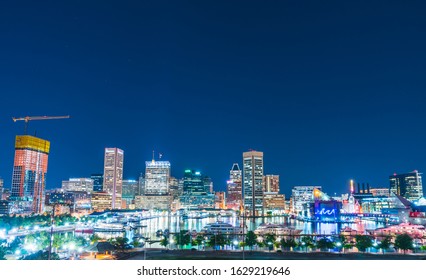 baltimore,maryland,usa. 09-07-17 :  Baltimore skyline at night with reflection in water.
