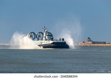 Baltiysk, Kaliningrad region, Russia - September 11, 2021. The landing craft on an air cushion "Mordovia" sails along the coast. Turbines in operation create strong splashes of water
