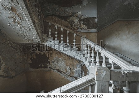 Balusters elegantly decorate the staircase
