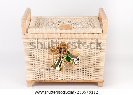 Bamboo basket isolated on white background Decorated with golden bell on top