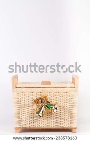 Bamboo basket isolated on white background Decorated with golden bell on top