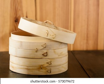 bamboo basket for steaming on a wooden table