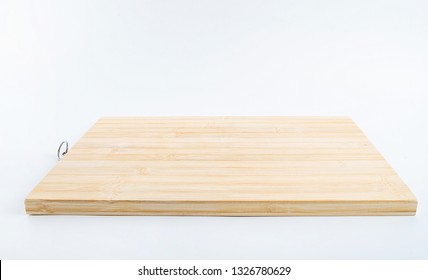 a bamboo chopping board on a white background - Shutterstock ID 1326780629