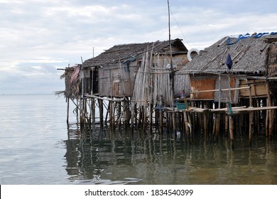 Bamboo Poles Support The Stilt Bajau Shanty Houses Built By Indigenous People In The Philippines. Lmedium Long Shot