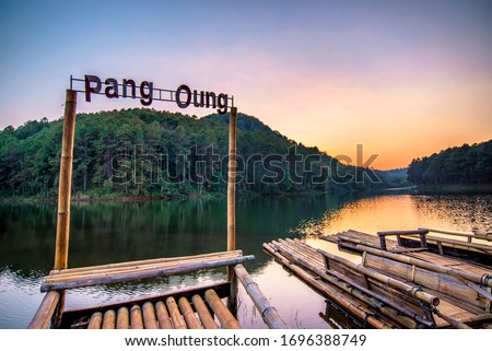 Bamboo raft and twilight sky at Pang Oung or Pang Tong Royal Project (Mae Hong Son, Thailand)