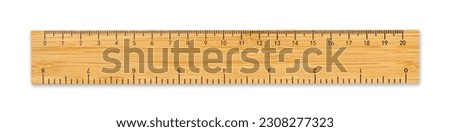 bamboo ruler with measures in centimeters and inches isolated on white background