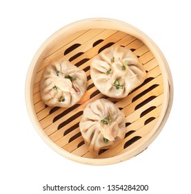 Bamboo Steamer With Tasty Baozi Dumplings On White Background, Top View