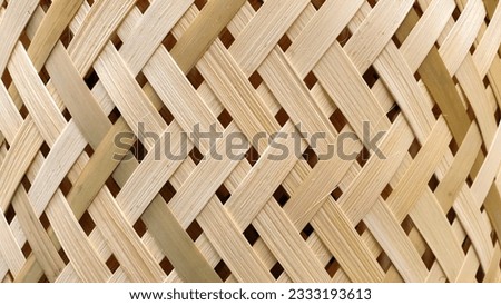 Bamboo wicker work pattern real photo. Asian traditional handcraft natural material weaving design texture background. Basketry bamboo pattern. Wooden bamboo texture. Woven art wallpaper.