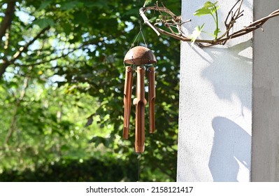 Bamboo Wind Chime. Decorating element that produces a pleasant sound on home garden. selective focus 