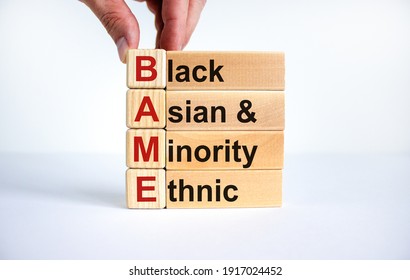 BAME Symbol. Abbreviation BAME, Black, Asian And Minority Ethnic On Wooden Cubes. Beautiful White Background. Copy Space. Business And BAME, Black, Asian And Minority Ethnic Concept.