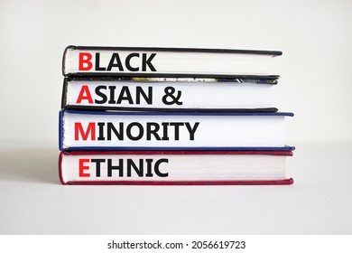 BAME symbol. Abbreviation BAME, black, asian and minority ethnic on books. Beautiful white background. Copy space. Business and BAME, black, asian and minority ethnic concept.