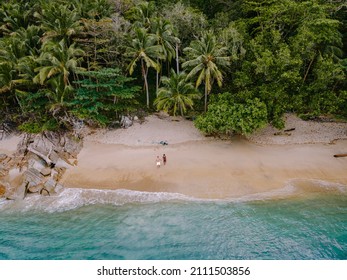 Banana Beach, Phuket, Thailand,A Beautiful Tropical Beach With Palm Trees At Phuket Island, Thailand, Located In Choeng Thale, Thalang, Couple Man And Woman Mid Age On Vacation In Thailand