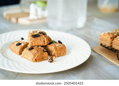 banana bread. this banana bread is homemade, i used brown sugar, flour, egg and also rile bananas. the top of the bread is almond slices, raisin, nuts and oat. the taste is so good and sweet. - Powered by Shutterstock