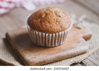 Banana Cake on wooden background, delicious sweet dessert cupcakes food or snack