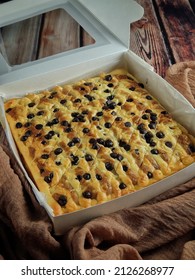 A Banana Cheese Cake With Yogurt And Chocolate Chips In The Box