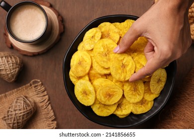 banana chips, popular Kerala snack deep fried in coconut oil. traditional South Indian tea time snack on banana leaf, Kerala India on Onam, Vishu, Diwali, Ramzan