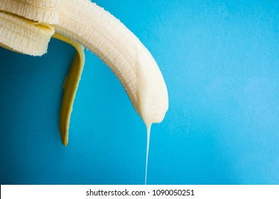 
banana with condensed milk. concept penis and semen.