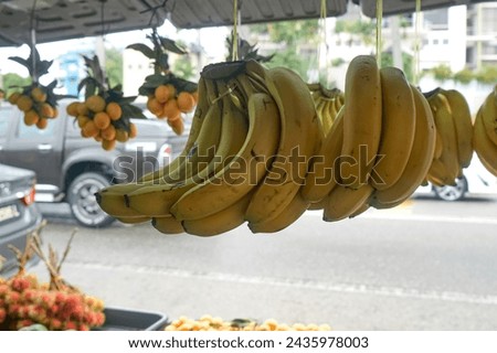 Banana hanging at a fruit stall 