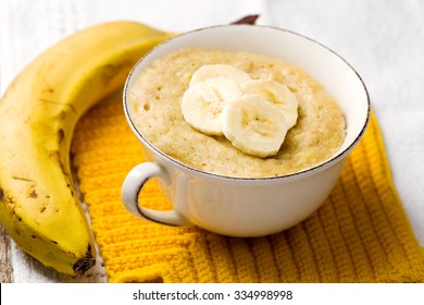  Banana  Mug Cake Prepared In Microwave . Horizontal Permission. Selective Focus