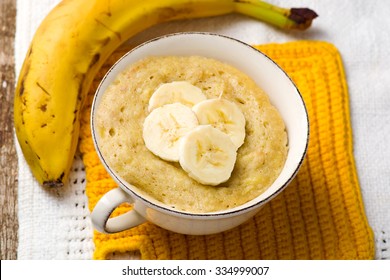  Banana  Mug Cake Prepared In Microwave . Horizontal Permission. Selective Focus