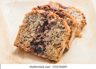 Banana Nutella Chocolate Cake On Wooden Plate- Top View