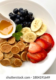 Banana Oatmeal Pancakes With Stawberry, Blueberry And Honey