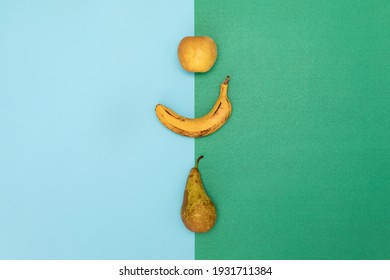 Banana, Pear And Apple On A Green And Light Blue Color Split Background. Diet With Fruits. 