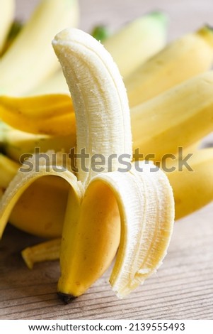 banana peel on wooden background, Close up ripe banana peel on floor