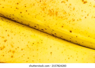 Banana skin close up. Background of ripe banana peel texture. Banana macro photo. Tropical fruit skin wallpaper - Powered by Shutterstock