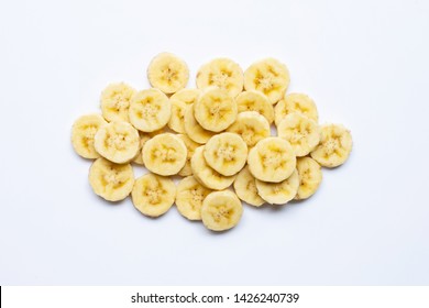 Banana Slices On White  Background. Top View