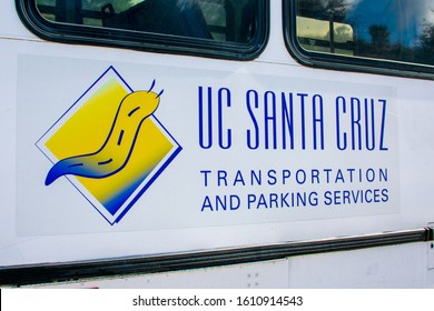 Banana Slug Mascot On Side Of US Santa Cruz Transportation Services Shuttle Bus - Santa Cruz, California, USA - 2019