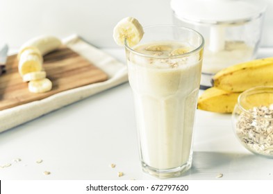 Banana smoothie. Milkshake with banana and oatmeal , healthy breakfast