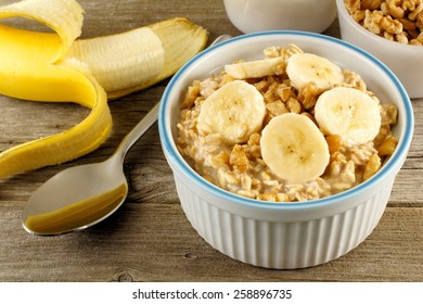 Banana Walnut Overnight Oatmeal In A Bowl On Wood Table