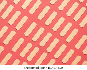 Band Aid Pattern On Red Background