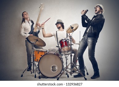 band of musicians plays - Shutterstock ID 132936827
