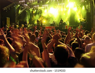 Band at a rock concert. Blur crowd