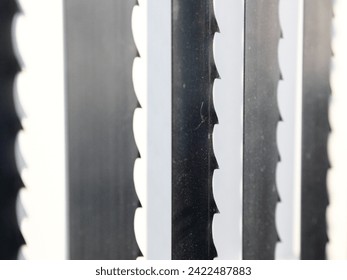 Band saw blades for wood sawing closeup. Woodworking machine equipment - Powered by Shutterstock