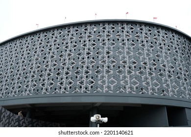 Banda Aceh, Indonesia - August 19, 2022 : The Gray Exterior Wall Of The Tsunami Museum Is Photographed From The Outside