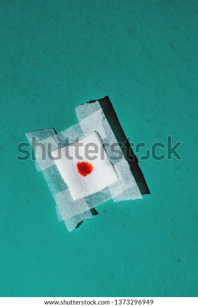Bandage Gauze Blood On Green Background Stock Photo Edit Now