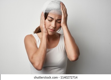    Bandage On Her Head Concussion Woman Migraine                            