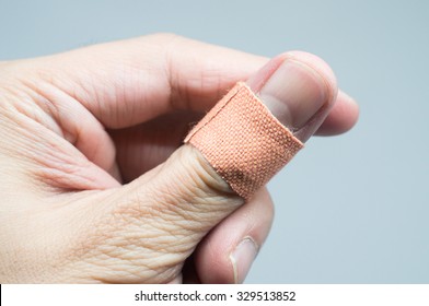 bandaid on hand isolated on white background