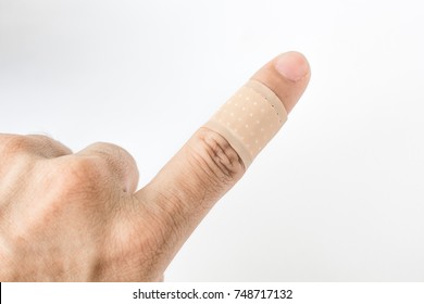 Bandaid on the index finger isolate background