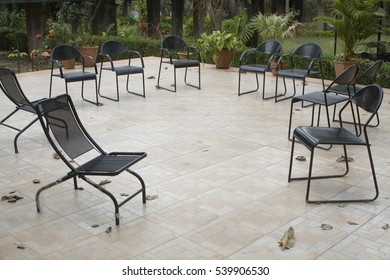 Bandhavgarh  /  India 11 March 2010 , Group Of Empty Metal Chairs Arranged In A Semi Circle In Outdoor Garden At Bandhavgarh  Madhya Pradesh   India  