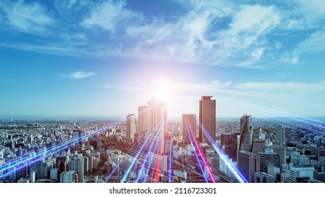 Bands of light running through a modern city. Road to tomorrow. - Shutterstock ID 2116723301