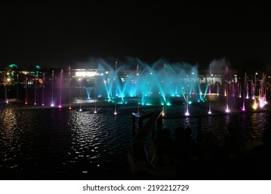 Bandung, 20 August 2022 - Fountain Show At Kiara Artha Park At Night, The New Modern Public Park In Bandung City