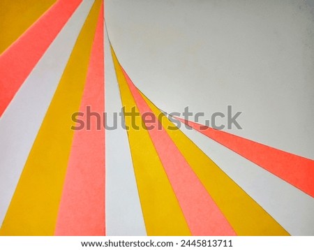 Bandung, Apr 04, 2024 :Colorful curve lines pattern from cardboard cake box cutting for background at home.