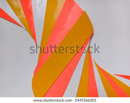 Bandung, Apr 04, 2024 : Concept art of colorful abstract curve line pattern from used bunch of cardboard cake box cutting at home.