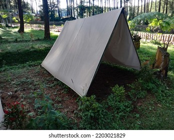 Bandung, Indonesia 5 May 2022, A Triangle Classic Style Tarp Tent At Camping Ground