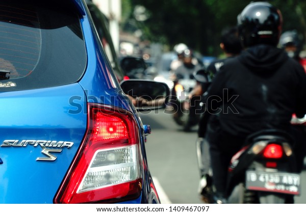 Bandung, Indonesia - April 27, 2019: Traffic\
conditions in Padalarang area, alternative routes to Bandung, West\
Java, Indonesia.